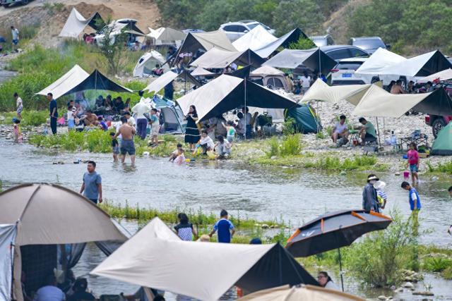 端午小長假“好玩不貴”：周邊游出游人次占比近50%，主題樂園景區(qū)最受歡迎  第1張
